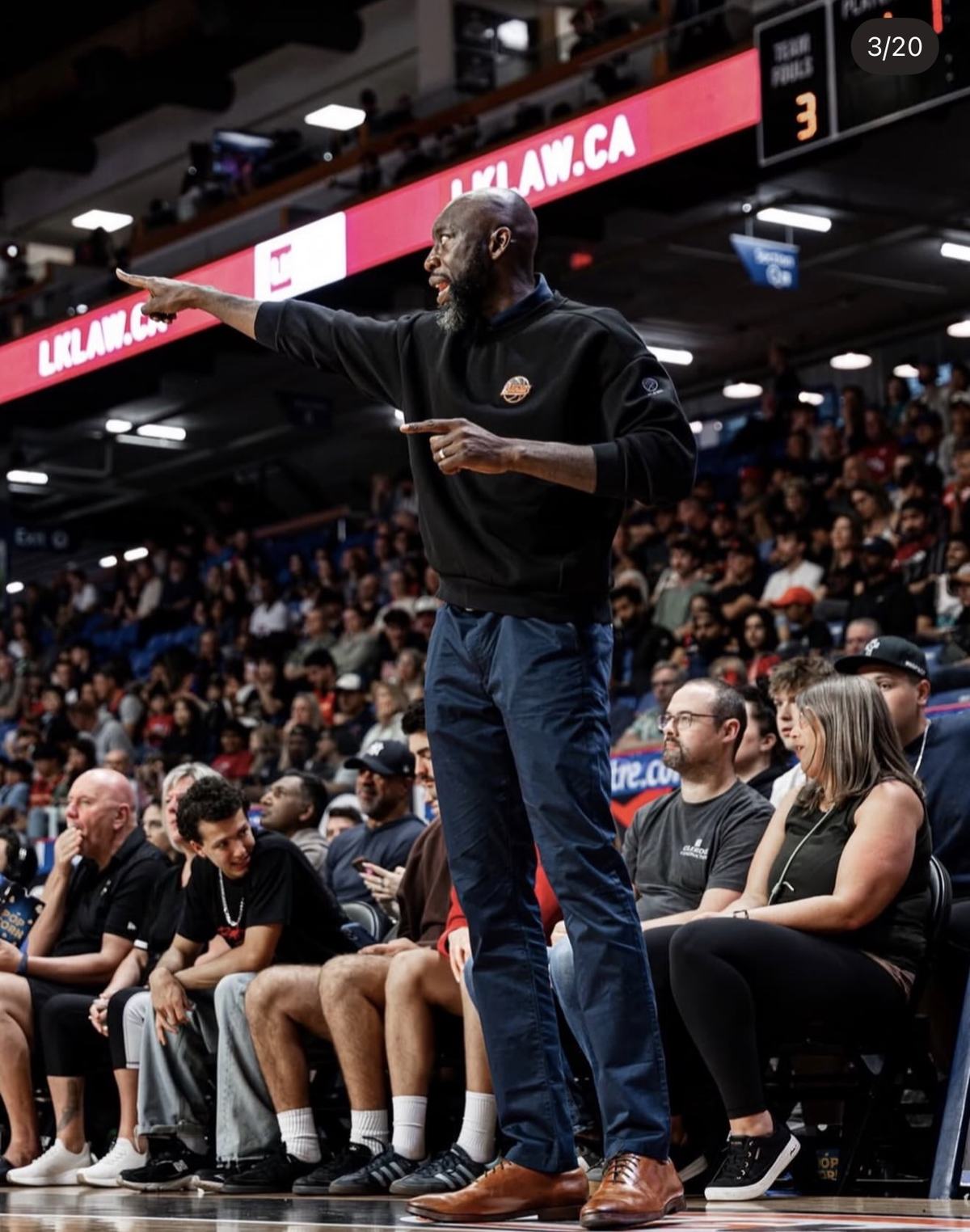 Ransford Brempong coaching courtside