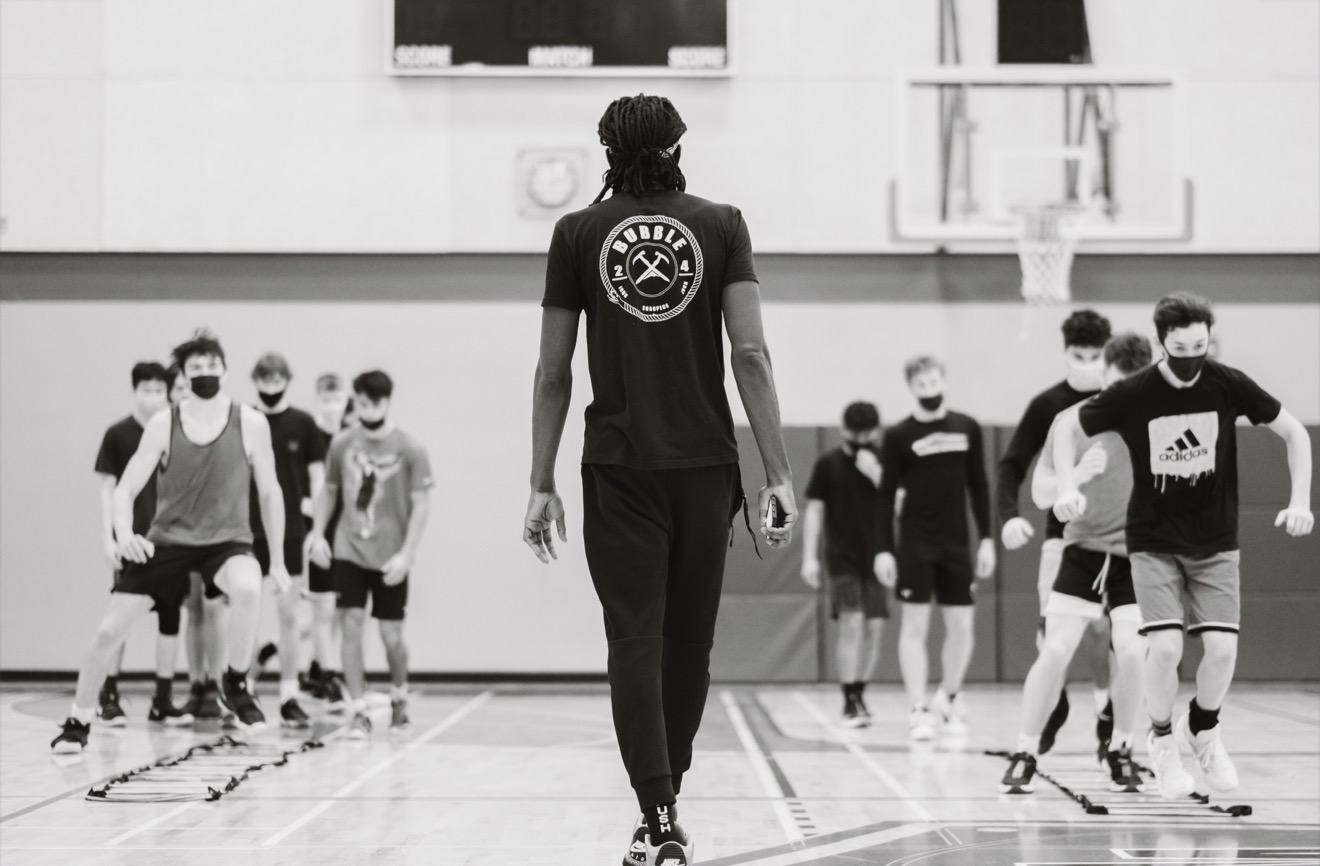 WCT team walking onto the court